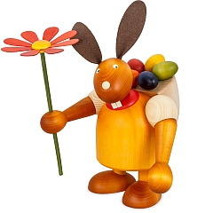Big easter bunny yellow with eggs and flowers