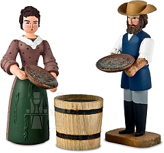 Man and woman with water barrel