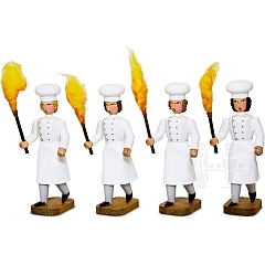 Four bakers with torch