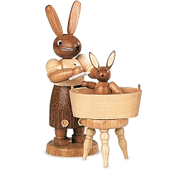 Easter bunny mother with little child have a bath, small natural