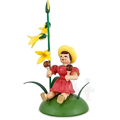 Flower Child colored sitting with Forsythia and Maraca