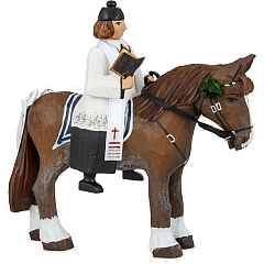 Priest on horseback carved
