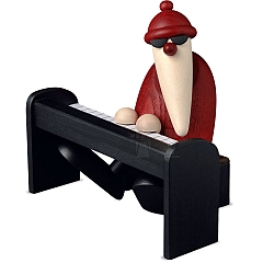 Santa Claus at the black piano